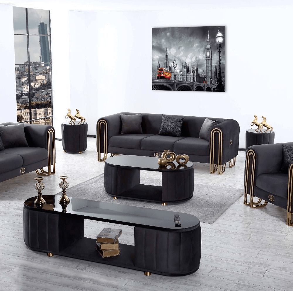 Maria soffgrupp i mörkgrå färg med guldfärgade ben.